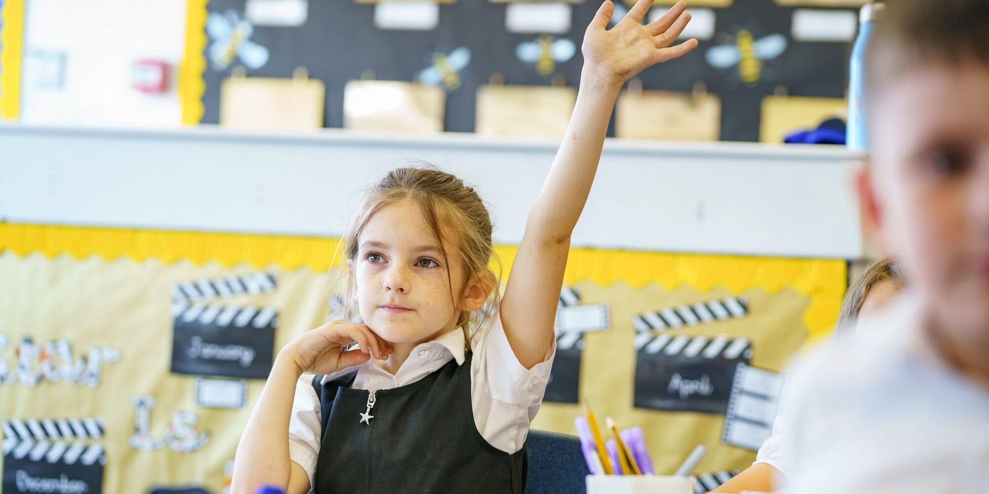 Camp Hill Pupil holding up hand