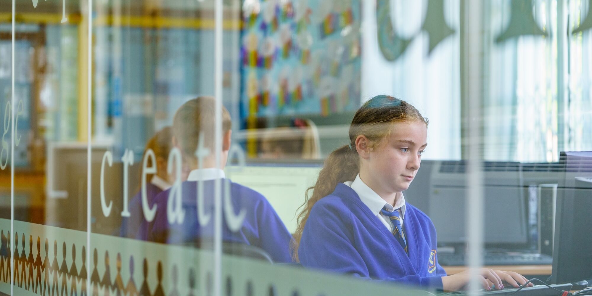 Camp Hill Pupil on computer