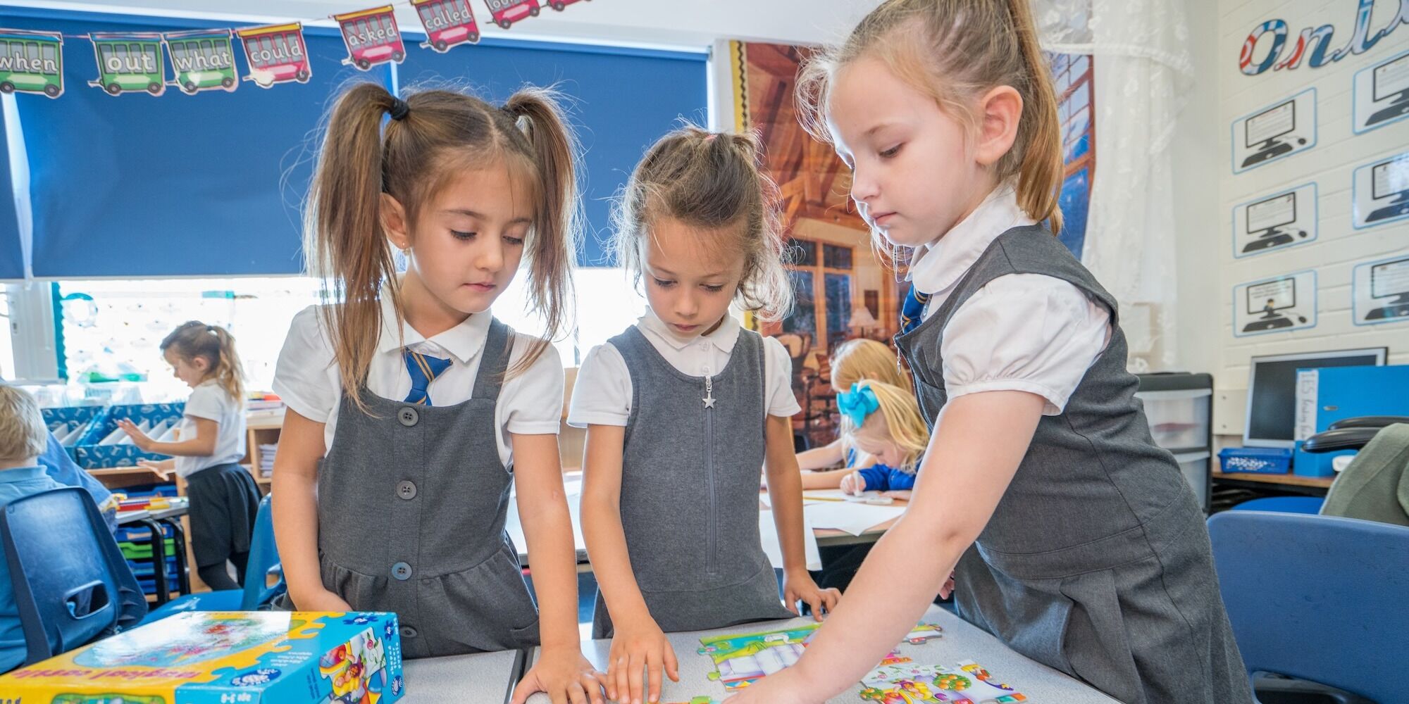 Camp Hill Pupils putting together a puzzle